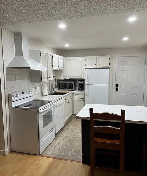 Kitchen and entry