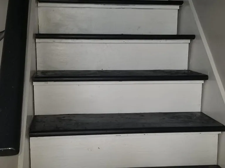 Black accents. Runner recommended.