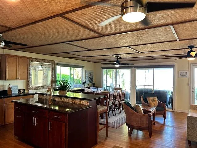 Kitchen Island, ceiling fans with living room with Sofa Bed