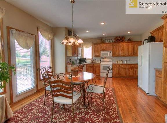 Wood floors flowing through out kitchen and breakfast area
