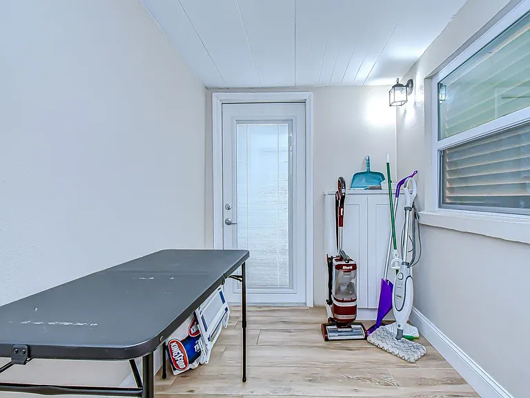 Laundry room leads to the private back patio