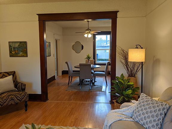 View of the dining room from the living room. Kitchen is off the left of the dinning room.