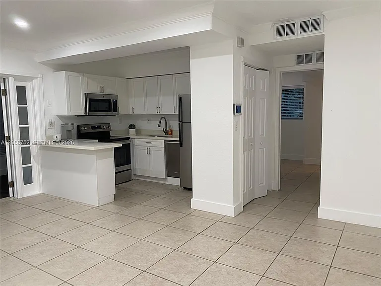 1 Edgewater Dr #103 — Photo 1