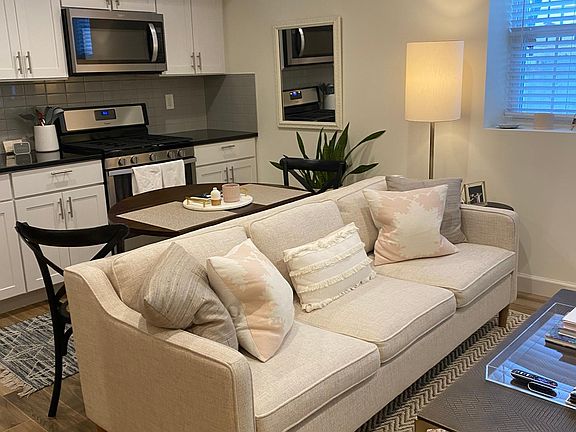 Living Room with Kitchen behind it