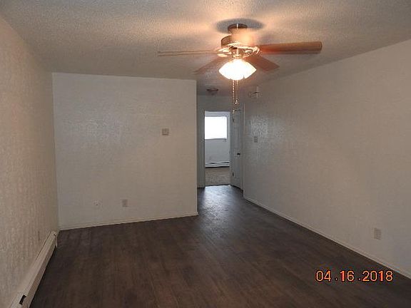 Living Room- with Ceiling fan - hardwood floor new as of Apr