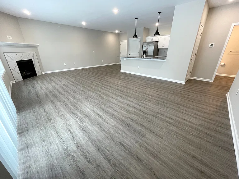 Open Concept Living Room and Kitchen with a Gas Fireplace