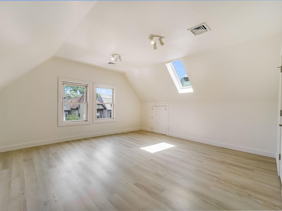 Super large Master Bedroom with tons of storage space and skylight