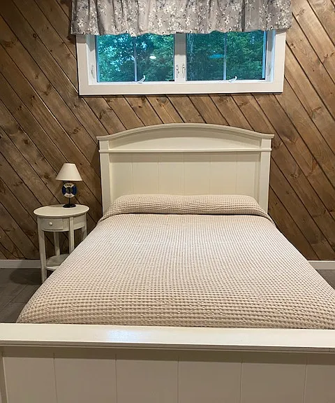 Photo of Master Bedroom area as taken from the inside the closet area.