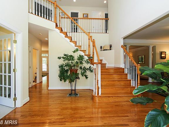 Large foyer with majestic staircase