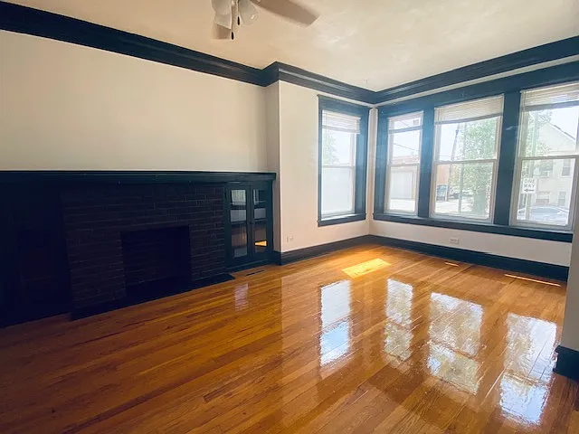 Building Photo - 4816 W Grace St #1