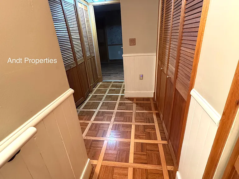 hallway to bedrooms w/parkay flooring