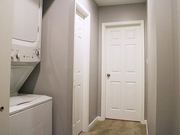 washer/dryer and hallway