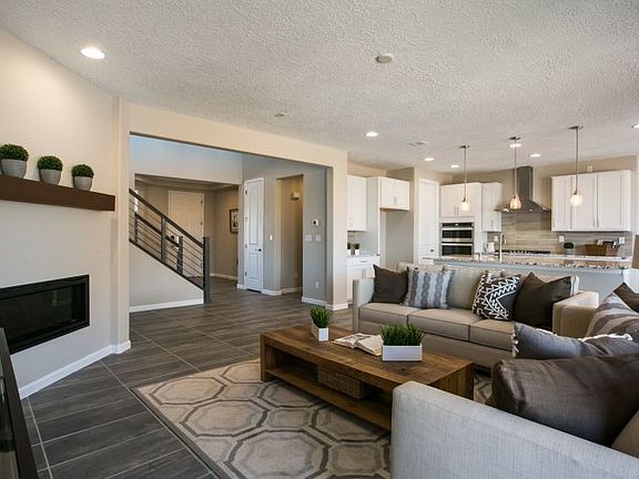 Accent your gathering room with a corner fireplace with mantle for a cozy ambiance to your gathering