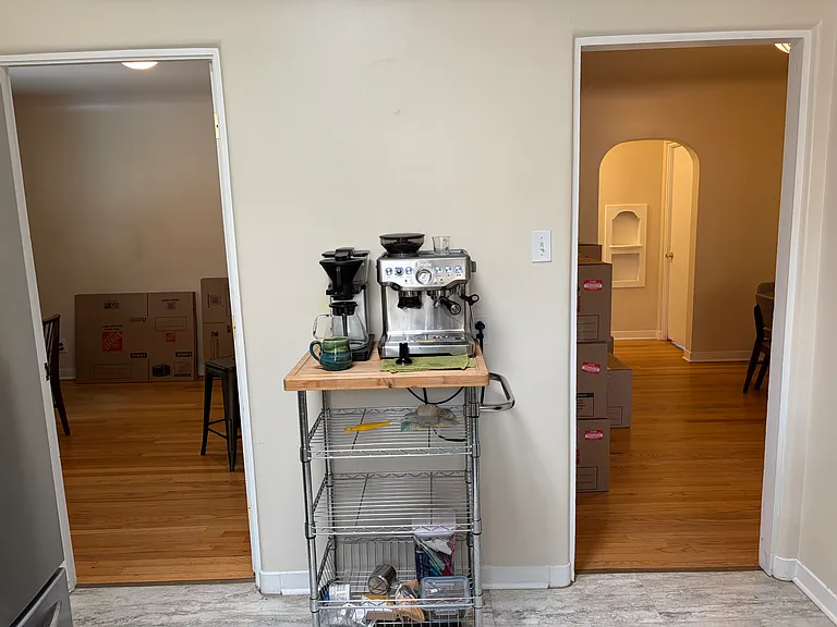View from kitchen south to office on left and dining room on right.
(I couldn't get the tenants to leave the coffee station)