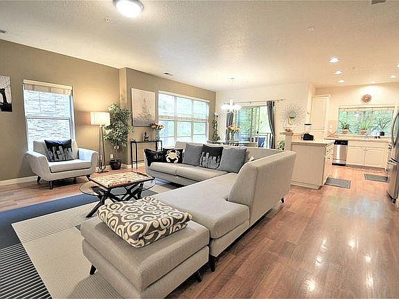 Living room opens to kitchen