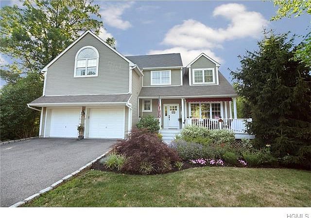 Welcome to this magnificent colonial home with expanded front porch.  The perfect place to spend quiet days relaxing.