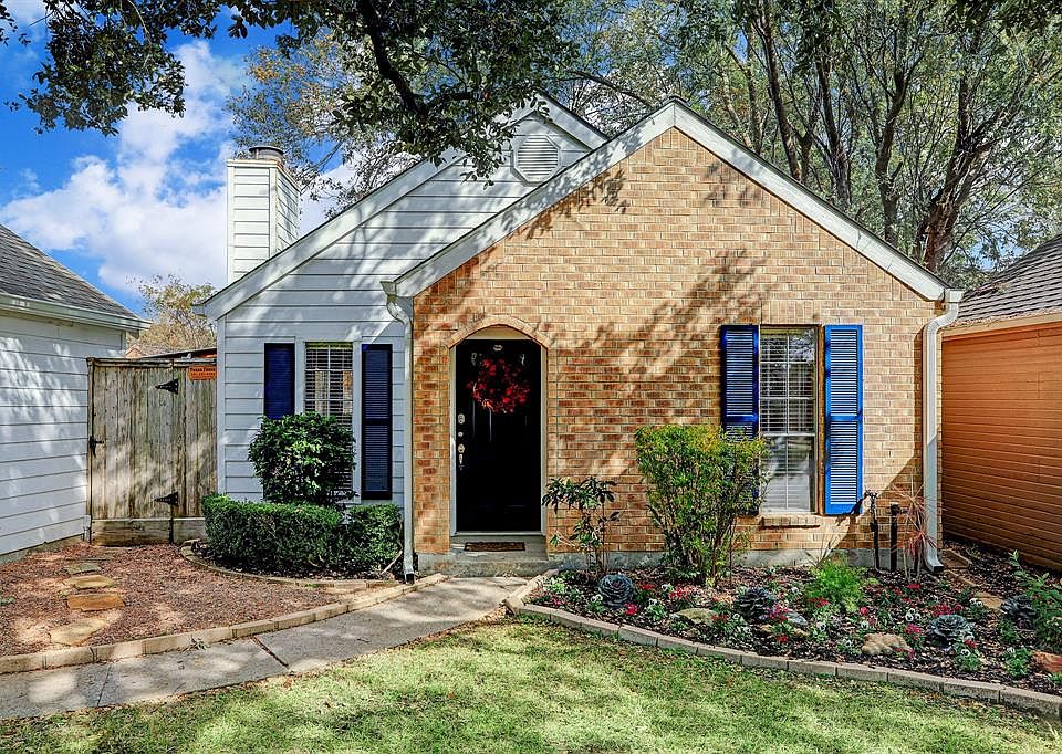 Welcome Home! Front view shows freshly painted door and shutters and new landscaping