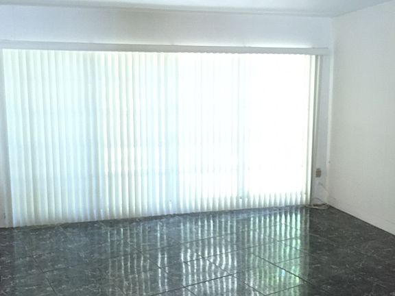 Living area 2 that overlooks large yard