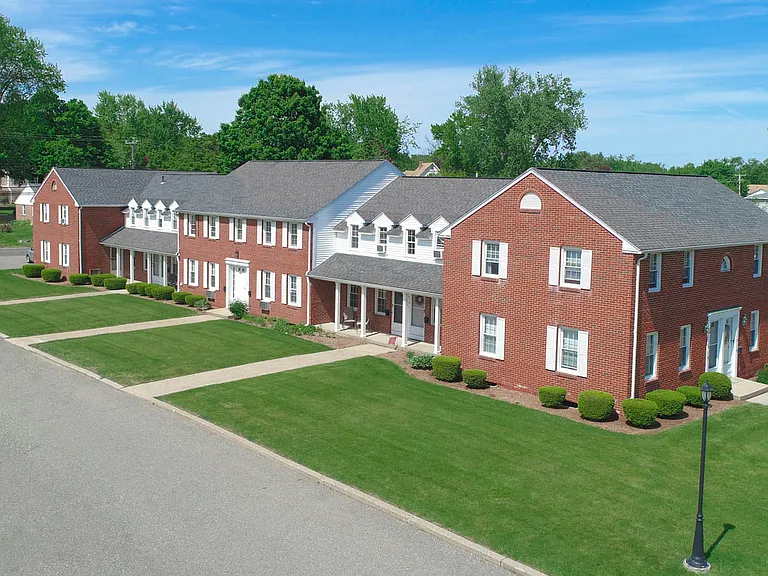 Timeless, Stunning Brick Town Homes- with impeccable grounds!