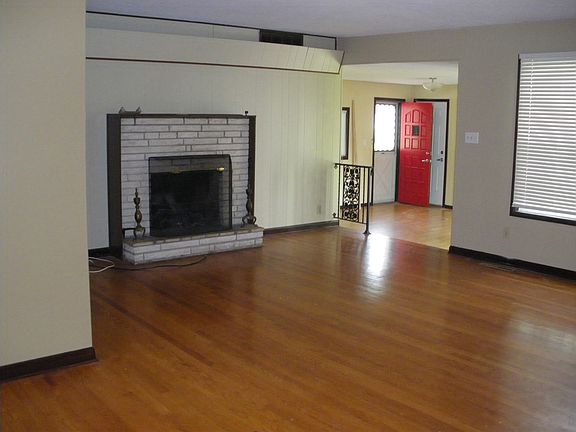 Living room looking into bonus room