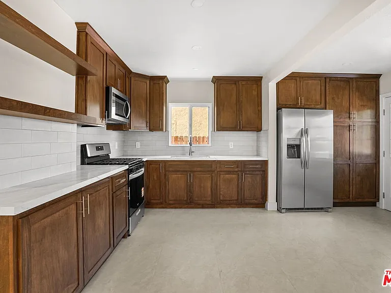 7806 Wellsford Ave — Photo 2