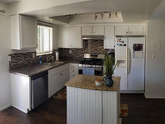 Large kitchen and dining area