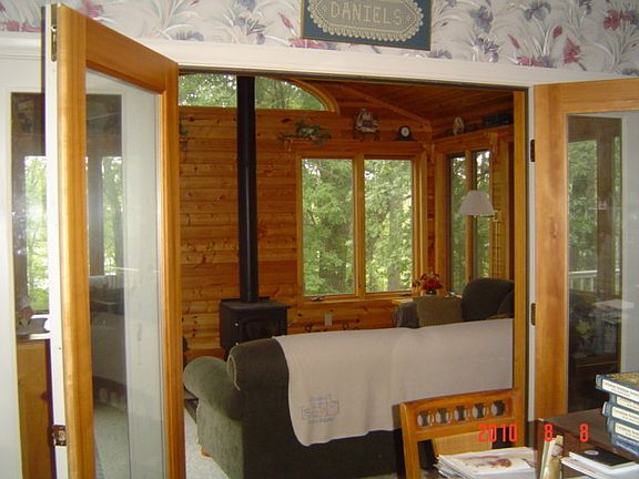 looking from formal dining room into 4 season porch
