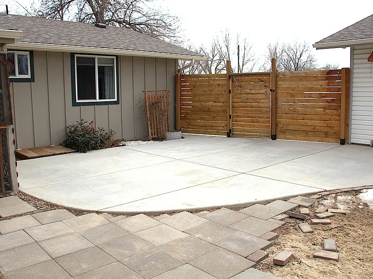 Patio and side gate with crawl space access