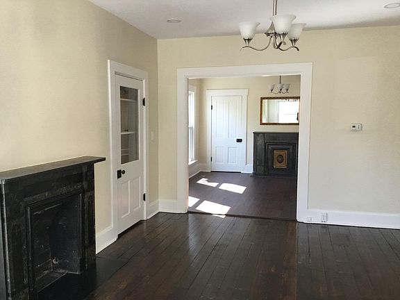 View into center living area. Either room can be used as a living room or dining room