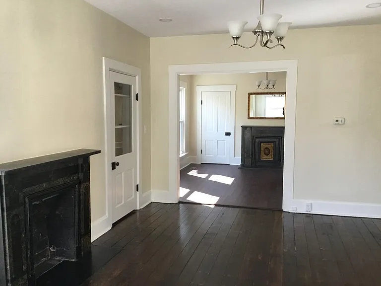 View into center living area. Either room can be used as a living room or dining room