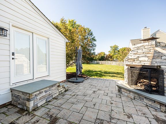 Stone patio and fireplace