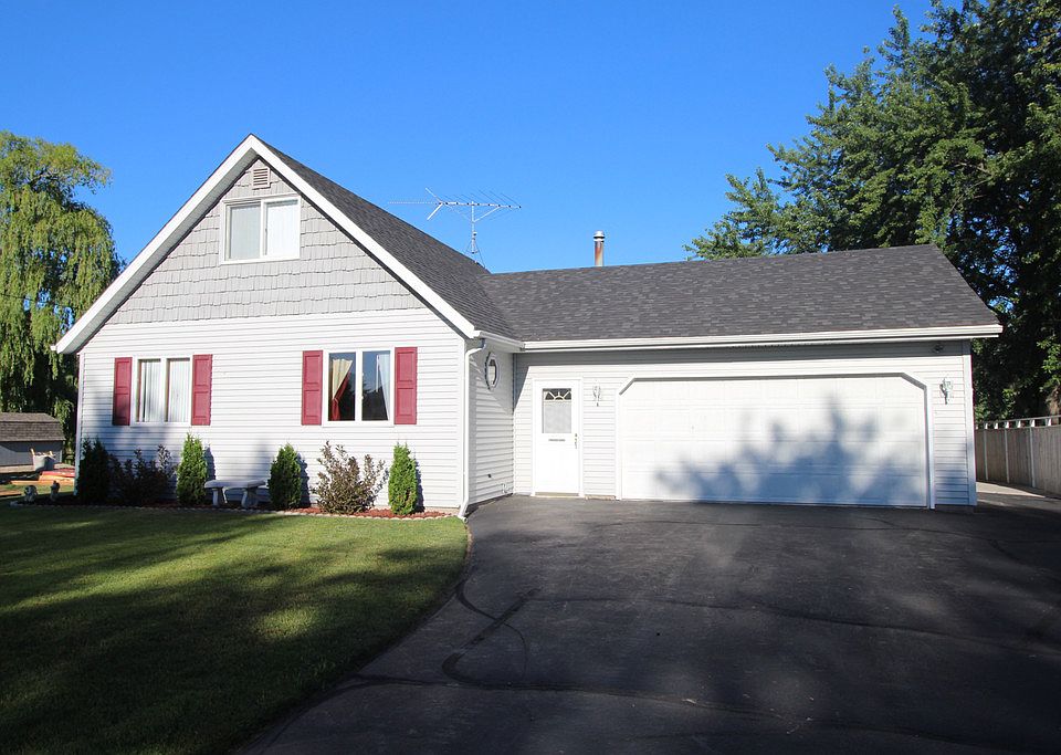 2 bedroom waterfront chalet on 100' wide Sunny Cove canal that leads to Saginaw Bay.  Newer kitchen, furnace and roof.  75' lot with steel seawall, moor your boat off your private dock.  World class walleye fishing just minutes away!  2 full service marina's within a few miles.  A true four seasons paradise!  NO FLOOD INSURANCE REQUIRED.  Sale is subject to seller finding suitable housing.