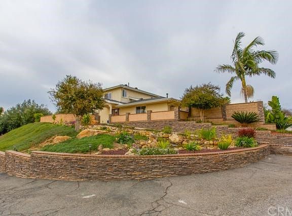 Main home with stacked stone walls