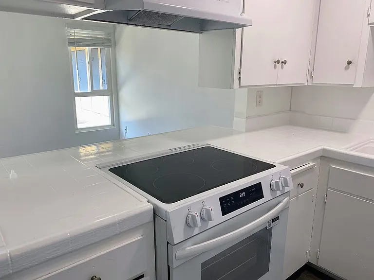 Village Apartments — Photo 16