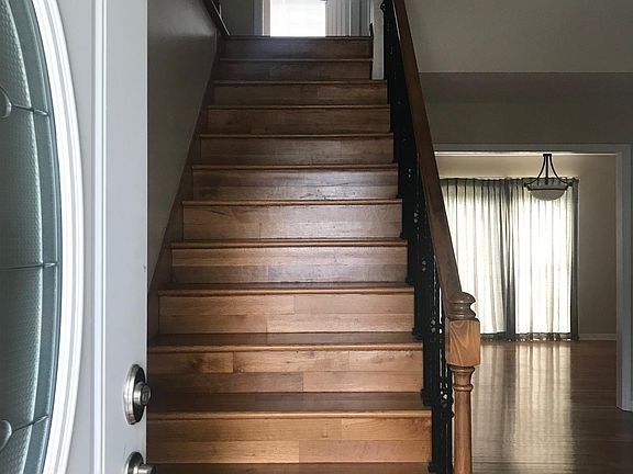 Front entry, hardwood stairs