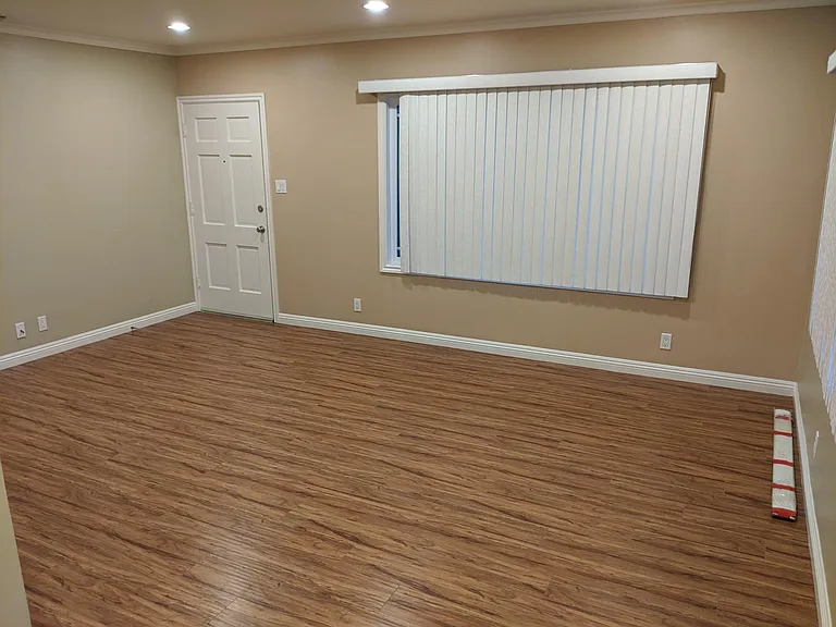 Main living room with front door entrance
