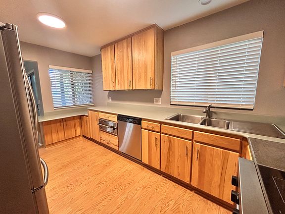 Kitchen showing dishwasher and Viking warming drawer