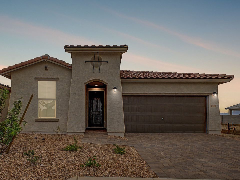 Dusk view of move-in ready single-story Clover home by DRB Homes at Sienna Park, 1315 S. 215th Drive