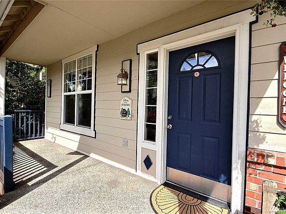 Welcome Home...covered front porch adds to curb appeal.