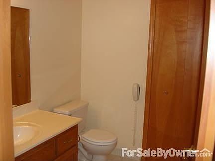 Half Bathroom
						:
						Bathroom off of kitchen and living room has an ample storage closet.