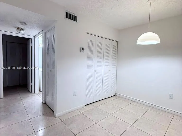 7090 NW 179th St #107 — Photo 3