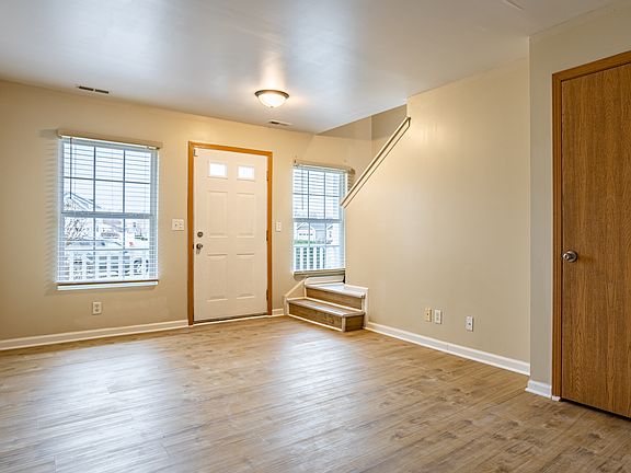 First floor living room and front door