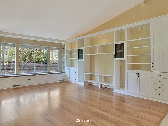 How dreamy is the window seat?! Custom built-ins found throughout the home. >
