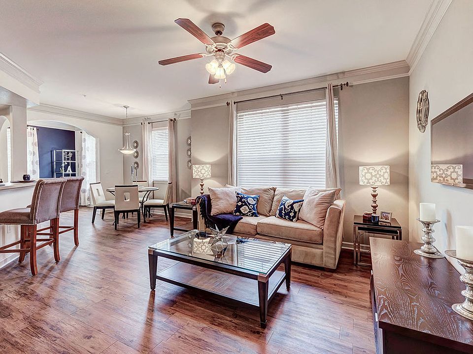Spacious Living Room with Attached Dining Room and Hard Wood Floors