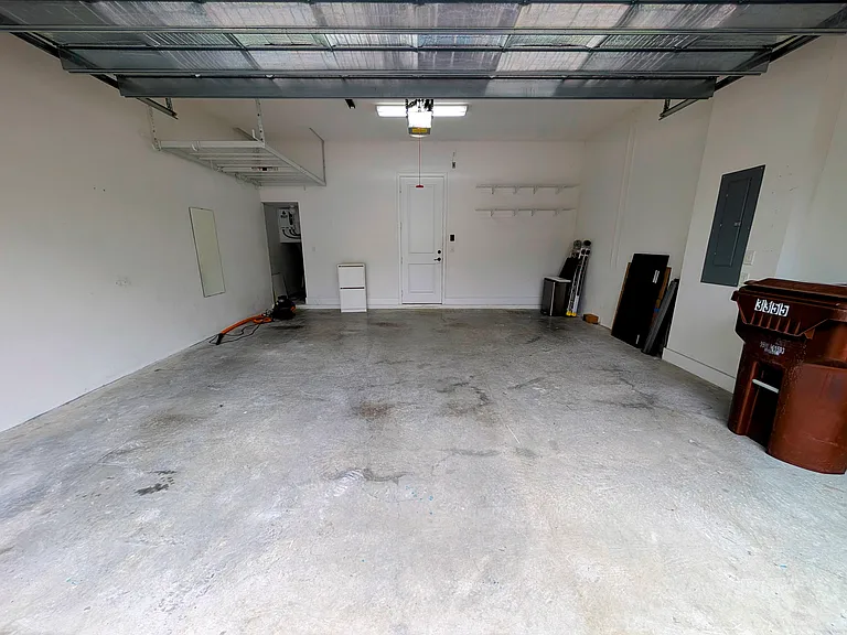-Ample storage featuring heavy-duty ceiling and wall racks
-Energy-efficient tankless on-demand water heater
-Fully insulated garage door