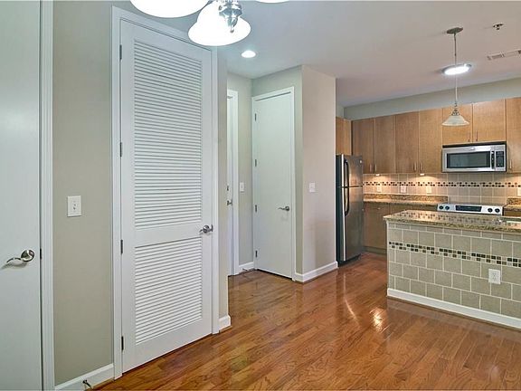 4th image of 711 Cosmopolitan Dr NE Unit 219