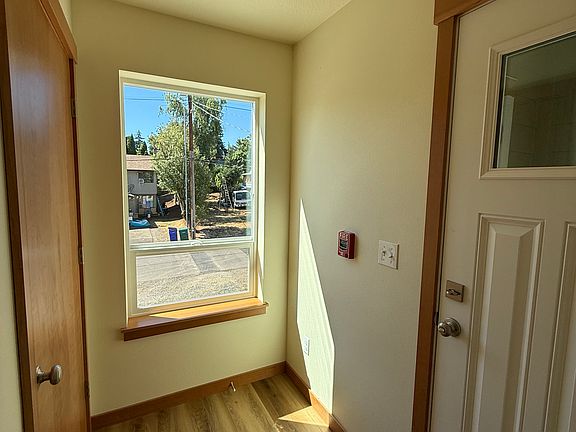 Entryway with beautiful window light and hall closet.