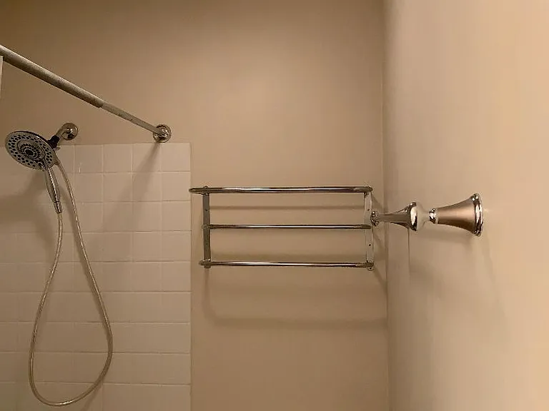 Bathroom w/ newly added towel racks