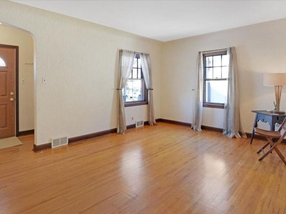 Entry and Living room (entry closet is hidden off to side of door)