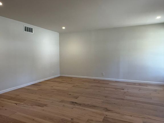 Living room with recessed lighting.